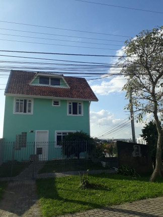Imagem Casa com 4 Quartos à Venda, 211 m² em Bairro Alto - Curitiba