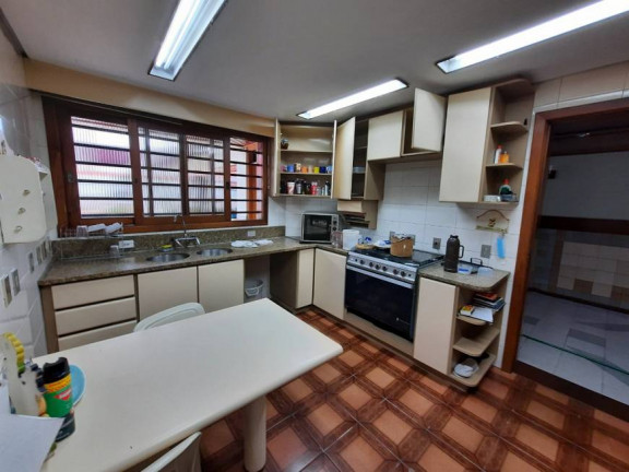Imagem Casa com 4 Quartos à Venda, 324 m² em Jardim Lindóia - Porto Alegre