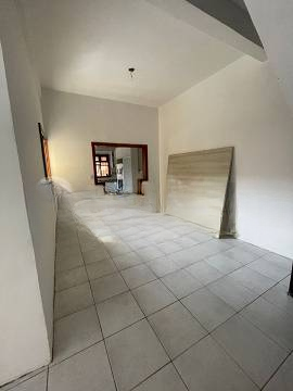 Imagem Sobrado com 4 Quartos à Venda, 233 m²em Santa Maria Goretti - Porto Alegre