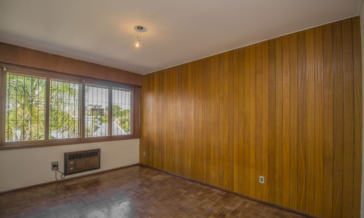 Imagem Casa com 3 Quartos à Venda, 246 m² em Jardim Lindóia - Porto Alegre