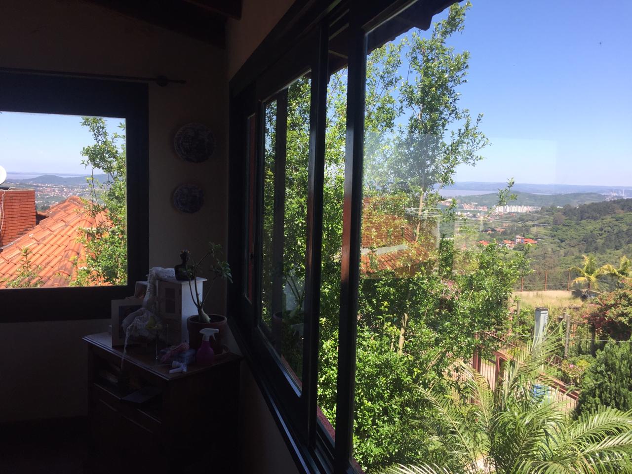 Imagem Casa com 3 Quartos à Venda, 220 m² em Vila Nova - Porto Alegre