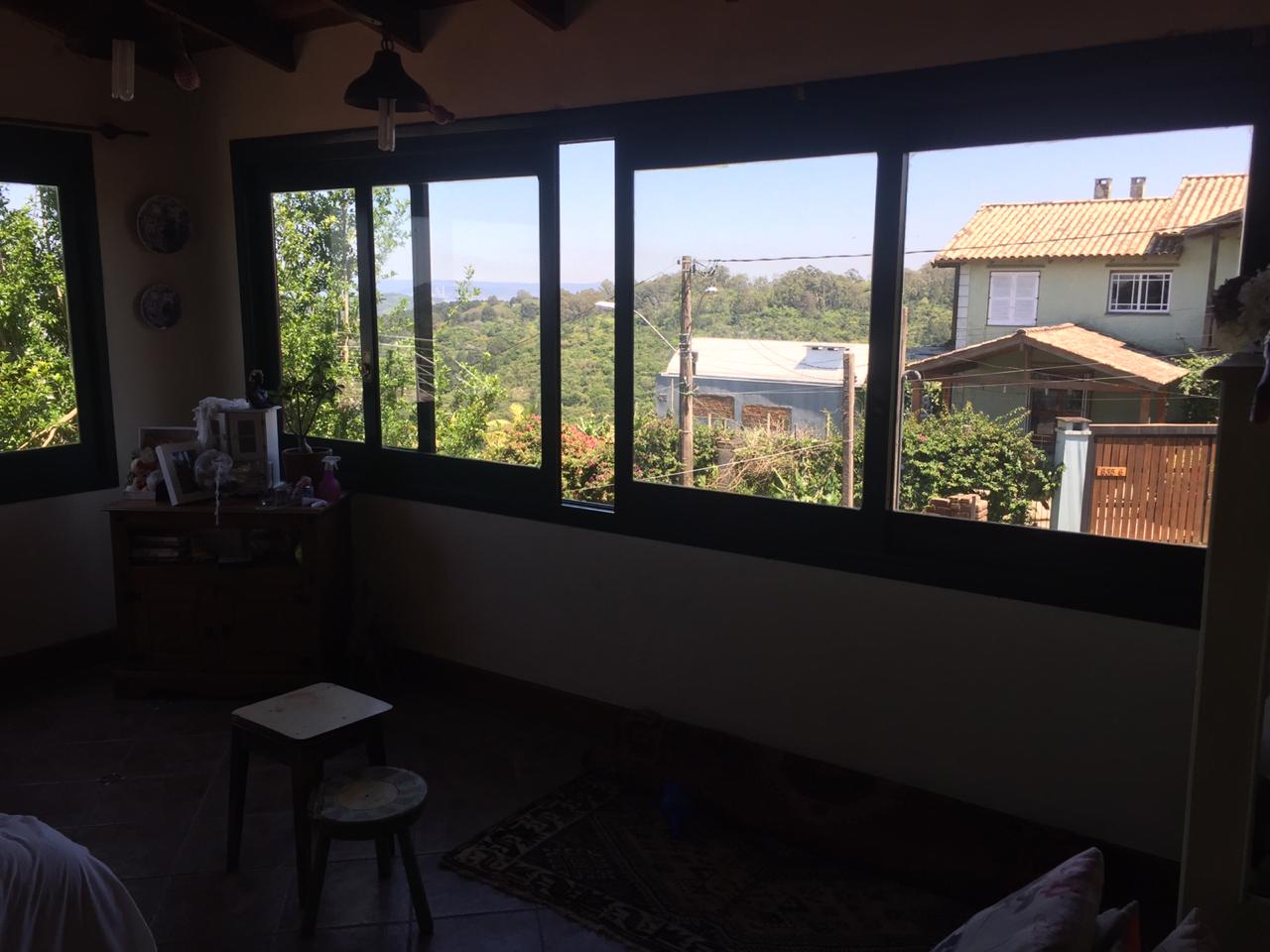Imagem Casa com 3 Quartos à Venda, 220 m² em Vila Nova - Porto Alegre