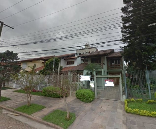 Imagem Casa com 4 Quartos à Venda, 324 m² em Jardim Lindóia - Porto Alegre