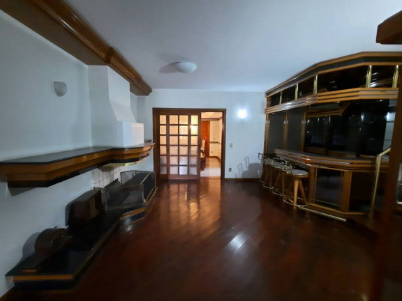 Imagem Casa com 4 Quartos à Venda, 324 m² em Jardim Lindóia - Porto Alegre