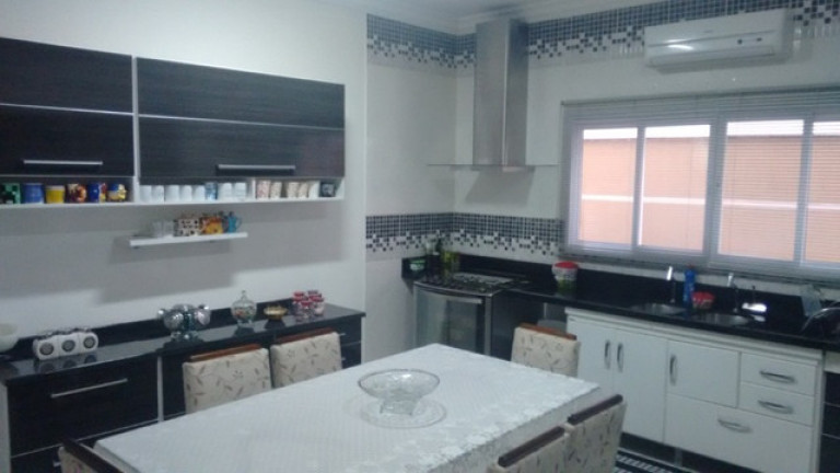 Imagem Sobrado com 5 Quartos à Venda, 305 m² em Cidade Jardim - Caraguatatuba