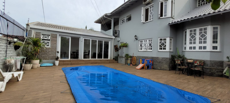 Imagem Casa com 4 Quartos à Venda, em Jardim América - São Leopoldo Imagem Casa com 4 Quartos à Venda, em Jardim América - São Leopoldo