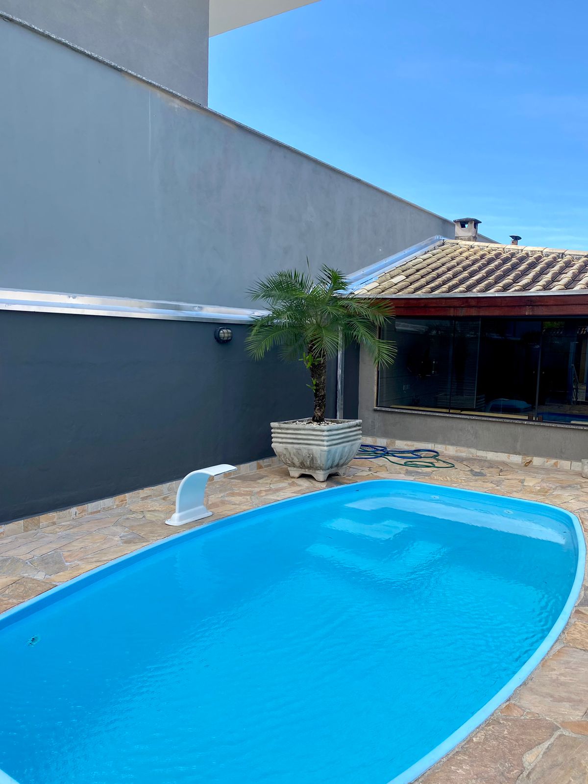 Imagem Casa de Condomínio com 4 Quartos à Venda, 160 m²em Massaguaçu - Caraguatatuba