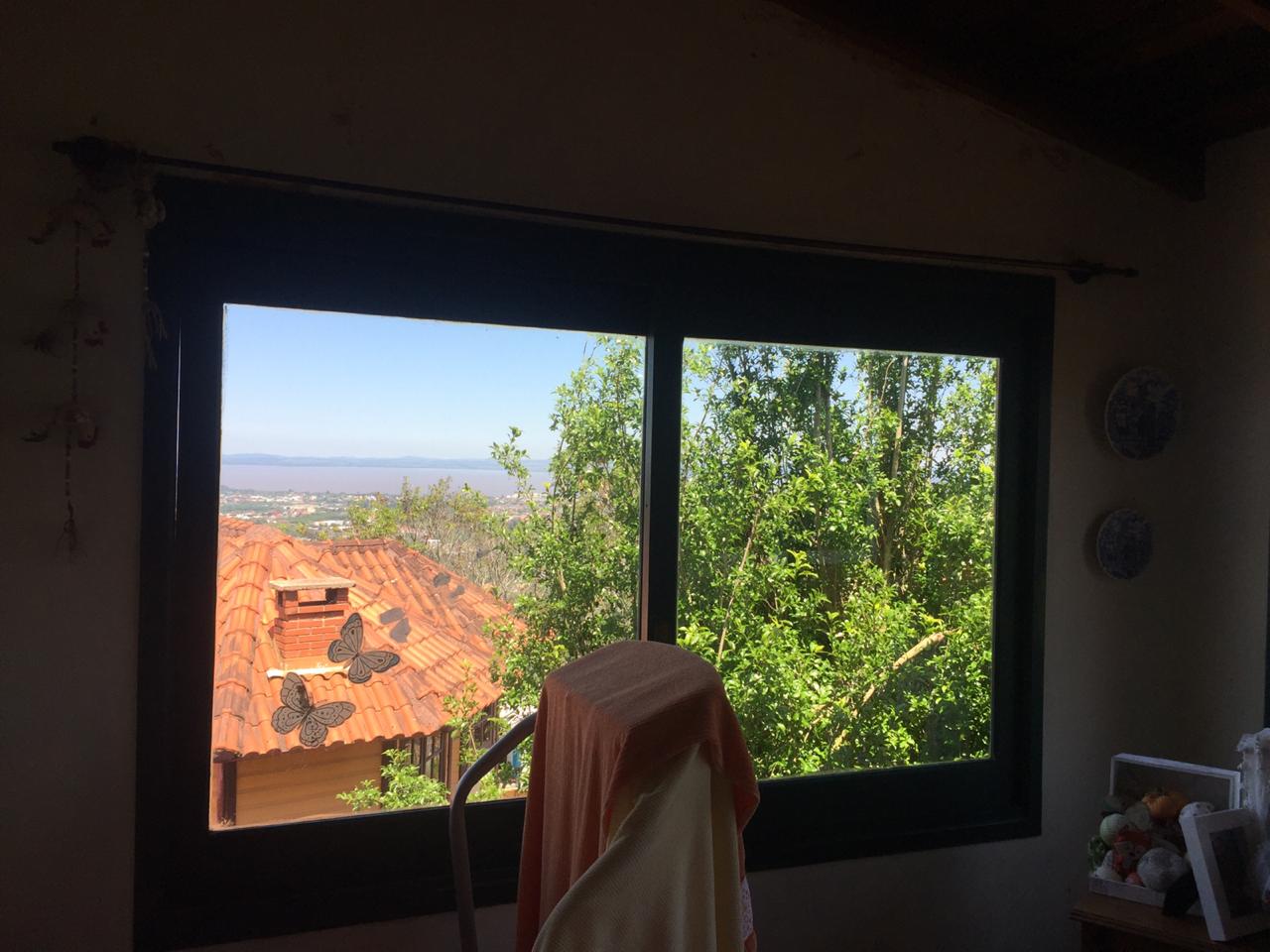 Imagem Casa com 3 Quartos à Venda, 220 m² em Vila Nova - Porto Alegre