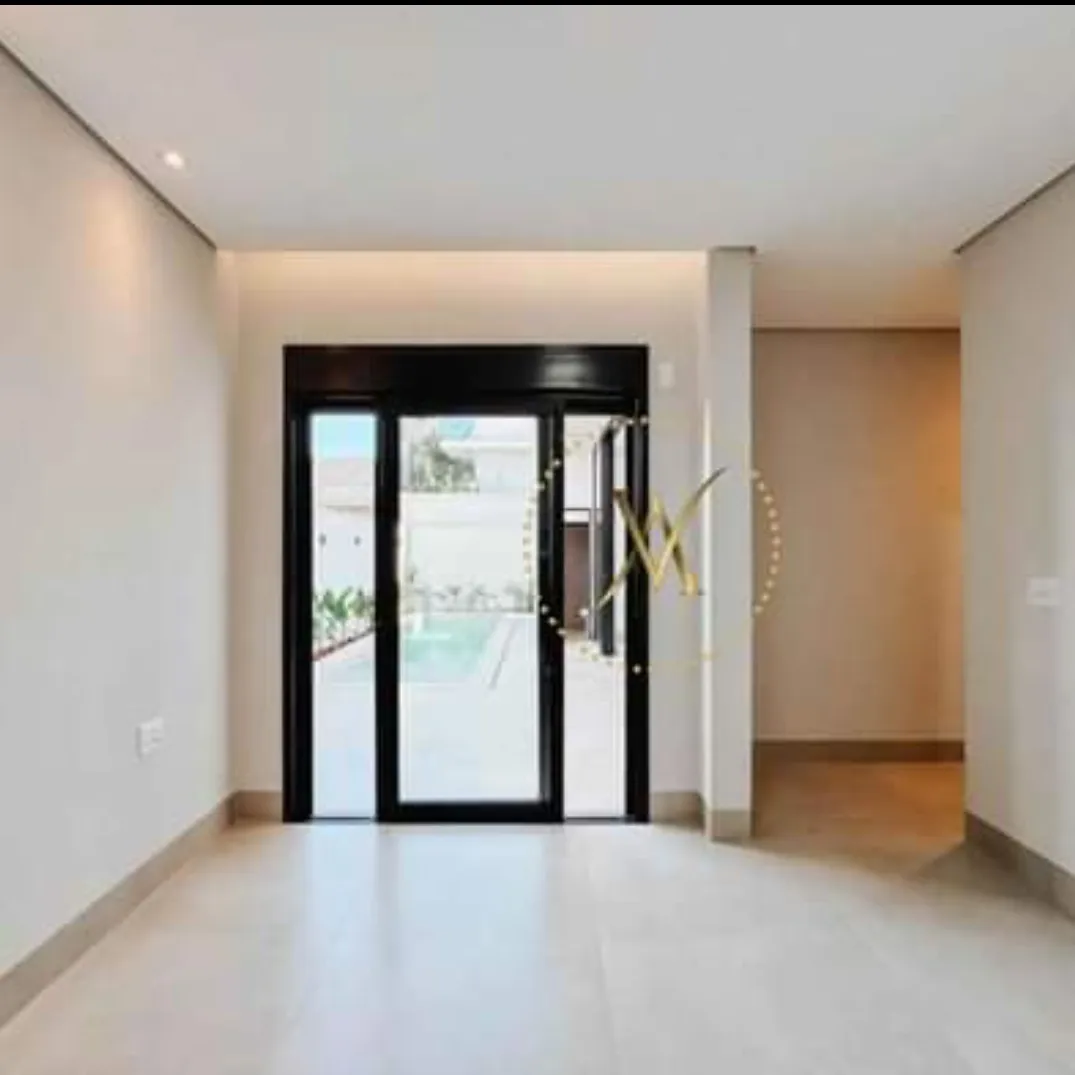 Imagem Casa de Condomínio com 3 Quartos à Venda, 245 m²em Laranjeiras - Uberlândia
