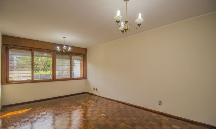Imagem Casa com 3 Quartos à Venda, 246 m² em Jardim Lindóia - Porto Alegre
