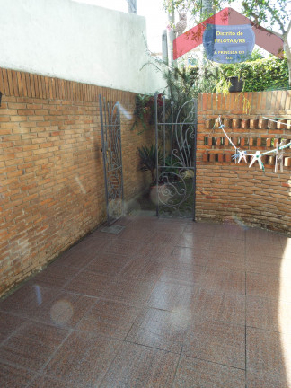 Imagem Casa com 4 Quartos à Venda, 315 m² em Centro - Pelotas