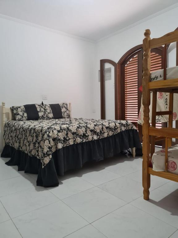 Imagem Casa com 4 Quartos para Temporada, 300 m²em Jardim Virgínia - Guarujá Imagem Casa com 4 Quartos para Temporada, 300 m²em Jardim Virgínia - Guarujá