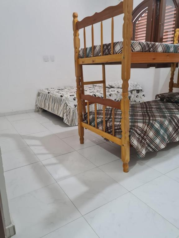 Imagem Casa com 4 Quartos para Temporada, 300 m²em Jardim Virgínia - Guarujá Imagem Casa com 4 Quartos para Temporada, 300 m²em Jardim Virgínia - Guarujá