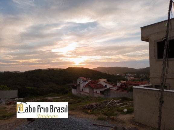 Imagem Casa de Condomínio com 3 Quartos à Venda, 73 m²em Peró - Cabo Frio
