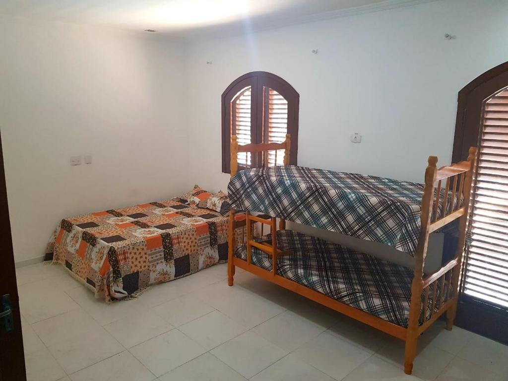 Imagem Casa com 4 Quartos para Temporada, 300 m²em Jardim Virgínia - Guarujá Imagem Casa com 4 Quartos para Temporada, 300 m²em Jardim Virgínia - Guarujá