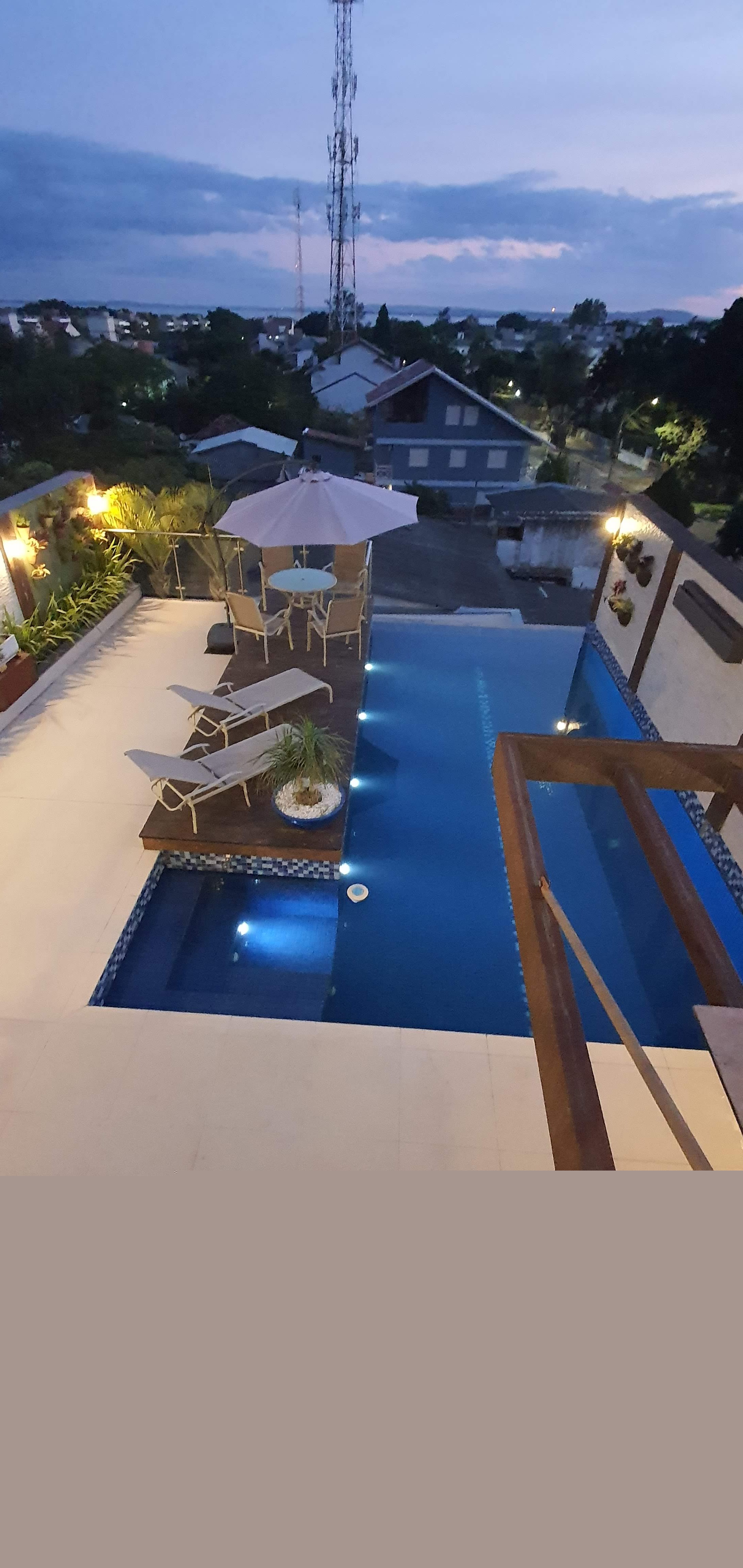 Imagem Casa com 4 Quartos à Venda, 600 m²em Pedra Redonda - Porto Alegre