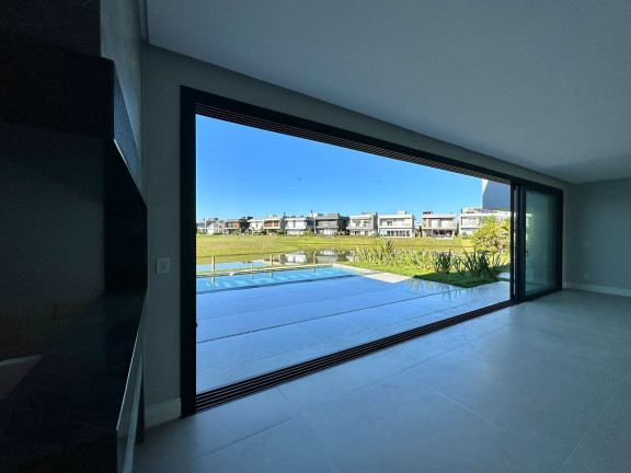 Imagem Casa de Condomínio com 4 Quartos à Venda, 250 m²em Zona Nova - Capão da Canoa