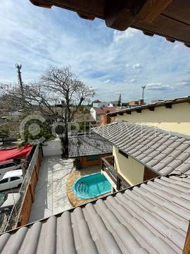 Imagem Sobrado com 4 Quartos à Venda, 233 m²em Santa Maria Goretti - Porto Alegre