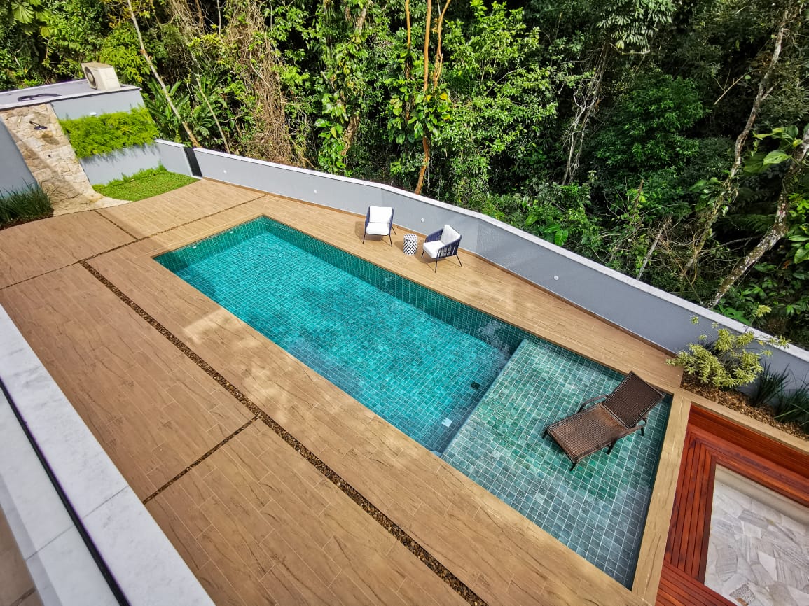 Imagem Casa com 6 Quartos à Venda, 148 m²em Riviera - Bertioga
