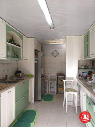 Imagem Sobrado com 4 Quartos à Venda, 280 m² em Rio Branco - Porto Alegre
