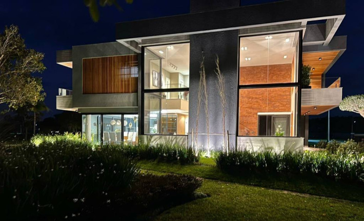 Imagem Casa de Condomínio com 4 Quartos à Venda, 250 m² em Arroio Teixeira - Capão Da Canoa