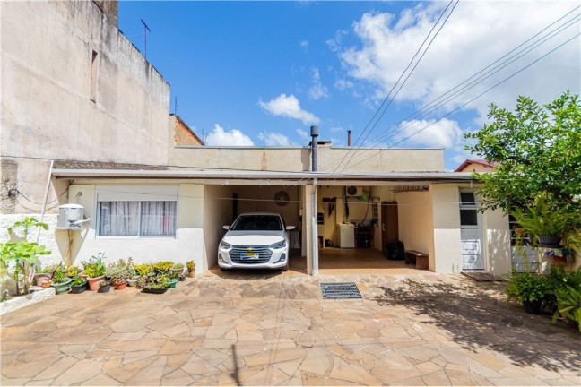 Imagem Casa com 3 Quartos à Venda, 139 m² em Santa Tereza - Porto Alegre