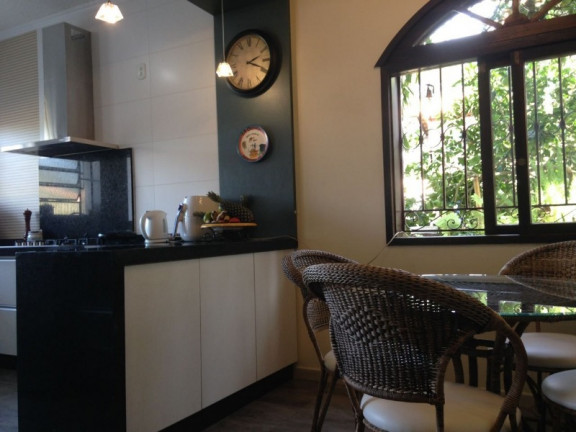 Imagem Casa com 3 Quartos à Venda, 339 m² em Ipanema - Porto Alegre