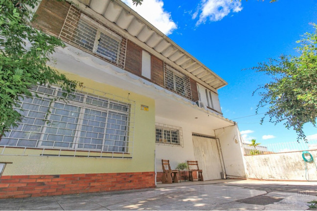 Imagem Casa com 5 Quartos à Venda, 254 m² em Três Figueiras - Porto Alegre