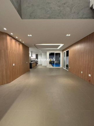 Imagem Casa de Condomínio com 4 Quartos à Venda, 343 m²