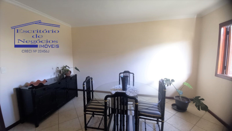 Imagem Casa com 4 Quartos à Venda, 260 m² em Vila Nova - Porto Alegre