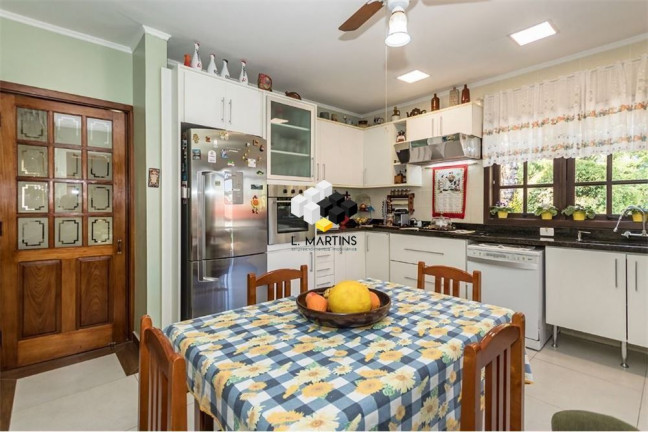 Imagem Casa com 4 Quartos à Venda, 525 m² em Jardim Sabará - Porto Alegre Imagem Casa com 4 Quartos à Venda, 525 m² em Jardim Sabará - Porto Alegre