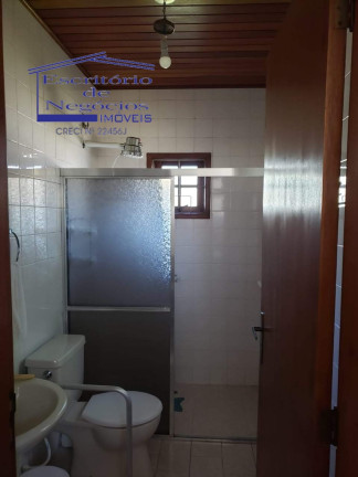 Imagem Casa com 4 Quartos à Venda, 268 m² em Cavalhada - Porto Alegre