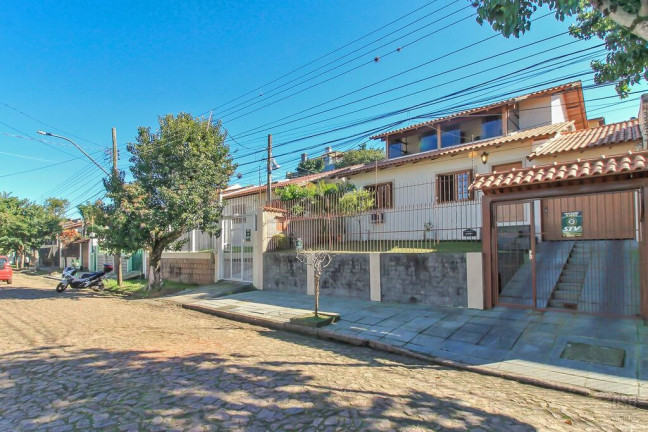 Imagem Casa com 3 Quartos à Venda, 205 m² em Tristeza - Porto Alegre