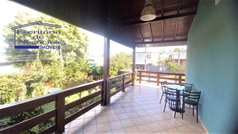 Imagem Casa com 4 Quartos à Venda, 260 m² em Vila Nova - Porto Alegre