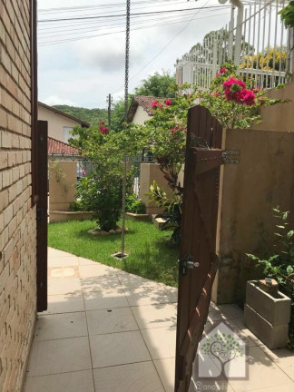 Imagem Casa com 4 Quartos à Venda, 255 m² em Pantanal - Florianópolis