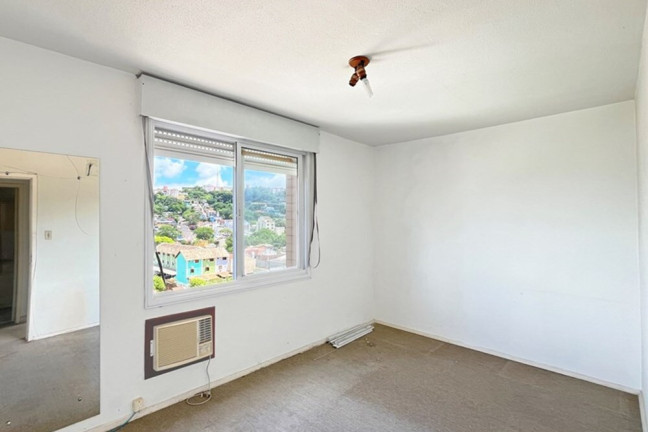 Imagem Imóvel com 2 Quartos à Venda, 59 m² em Nonoai - Porto Alegre