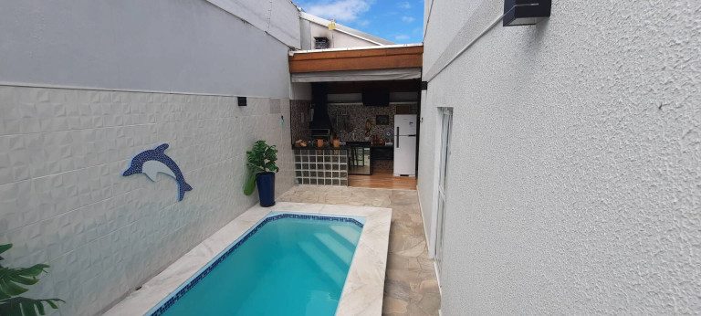 Imagem Casa de Condomínio com 2 Quartos à Venda, 110 m² em Massaguaçu - Caraguatatuba Imagem Casa de Condomínio com 2 Quartos à Venda, 110 m² em Massaguaçu - Caraguatatuba