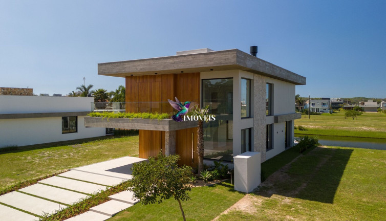 Imagem Casa de Condomínio com 4 Quartos à Venda, 359 m² em Centro - Torres