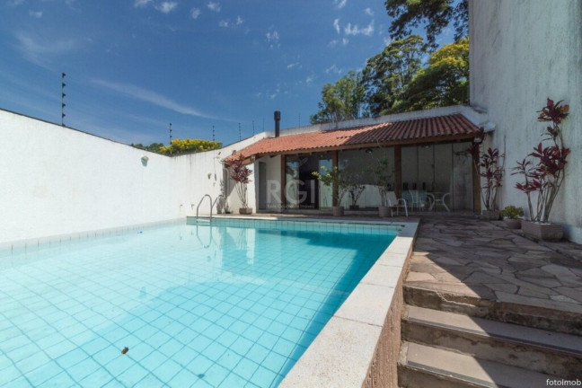 Imagem Imóvel com 5 Quartos à Venda,  em Cristal - Porto Alegre
