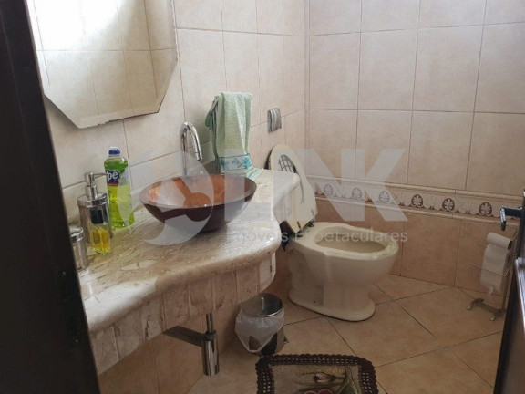 Imagem Casa com 4 Quartos à Venda, 338 m² em Jardim Itu - Porto Alegre