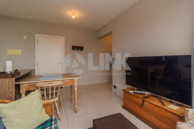 Imagem Apartamento com 1 Quarto à Venda, 35 m² em Santo Antônio - Porto Alegre Imagem Apartamento com 1 Quarto à Venda, 35 m² em Santo Antônio - Porto Alegre