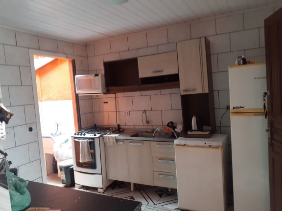 Imagem Casa com 2 Quartos à Venda, 124 m² em Uberaba - Curitiba