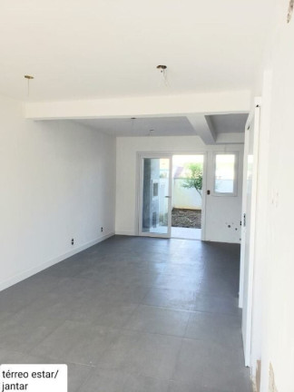 Imagem Casa de Condomínio com 3 Quartos à Venda, 150 m² em Mário Quintana - Porto Alegre
