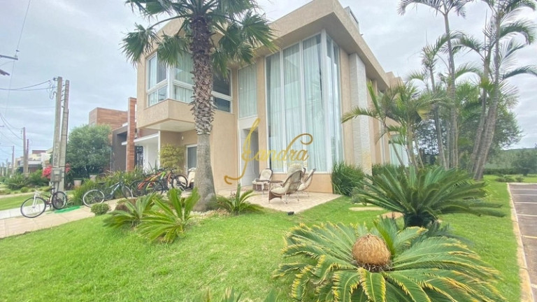 Imagem Casa de Condomínio com 4 Quartos à Venda, 220 m² em Rainha Do Mar - Xangri-la