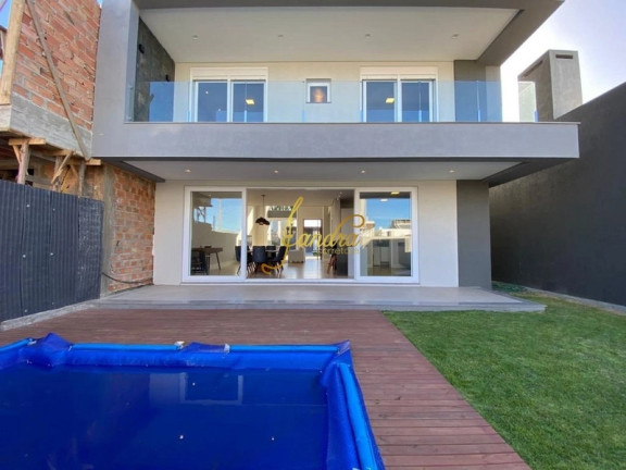 Imagem Casa de Condomínio com 4 Quartos à Venda, 228 m² em Centro - Xangri-la
