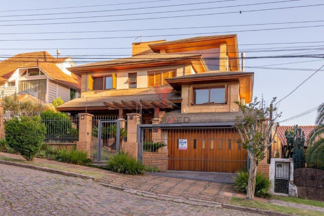 Imagem Casa com 4 Quartos à Venda, 498 m² em Ipanema - Porto Alegre