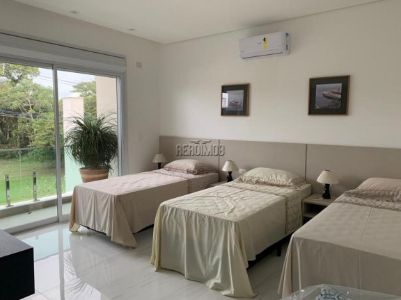 Imagem Casa com 7 Quartos à Venda, 607 m² em Riviera De São Lourenço - Bertioga