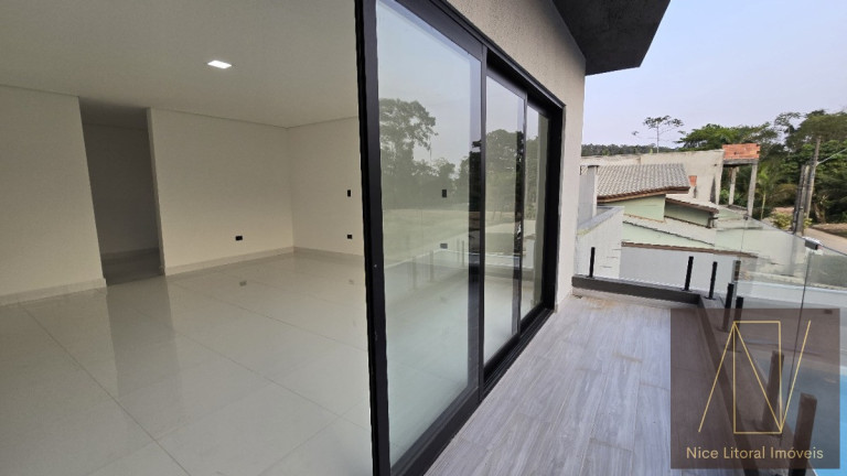 Imagem Sobrado com 4 Quartos à Venda, 300 m² em Massaguaçu - Caraguatatuba