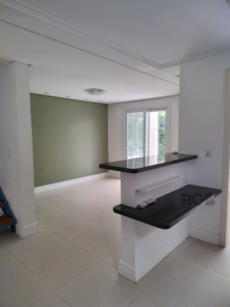 Imagem Sobrado com 3 Quartos à Venda, 230 m² em Lomba Do Pinheiro - Porto Alegre