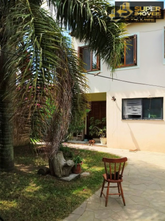 Imagem Casa com 4 Quartos à Venda, 300 m² em Três Vendas - Pelotas Imagem Casa com 4 Quartos à Venda, 300 m² em Três Vendas - Pelotas